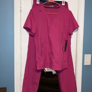 Bright pink Koi Lite scrub set